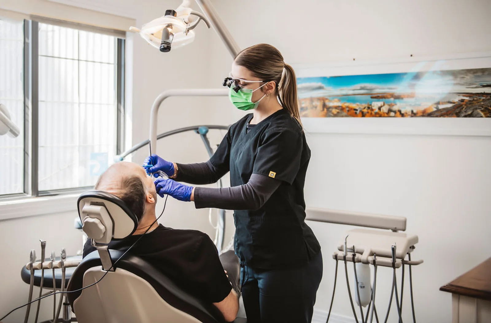 A Great Slave Dental hygienist treating a patient in the Yellowknife clinic